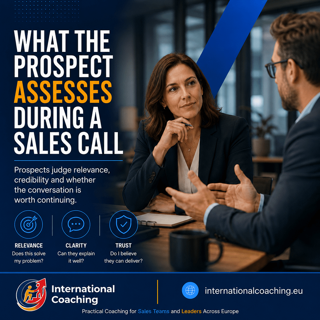 Prospect listens attentively during a sales conversation while the salesperson speaks, illustrating how buyers assess relevance, clarity and trust.